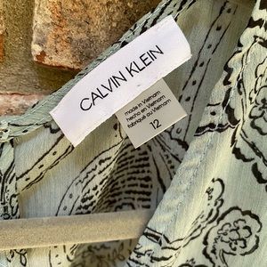 Calvin Klein’s faux wrap dress and asymmetrical